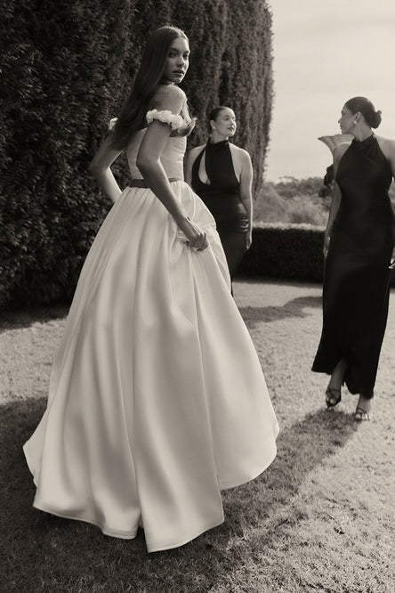 Image of woman in white bridal set.