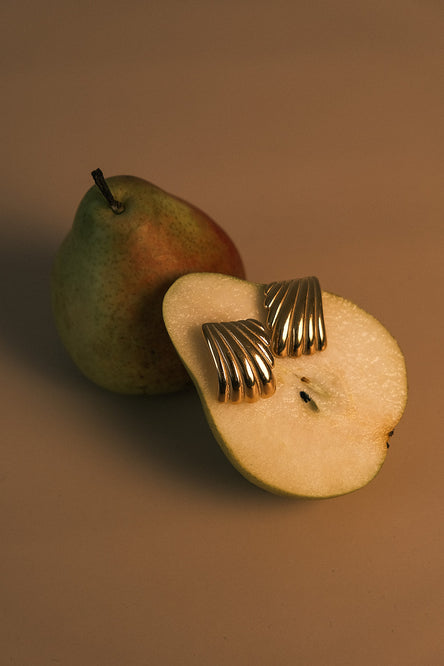 Image of gold earrings.